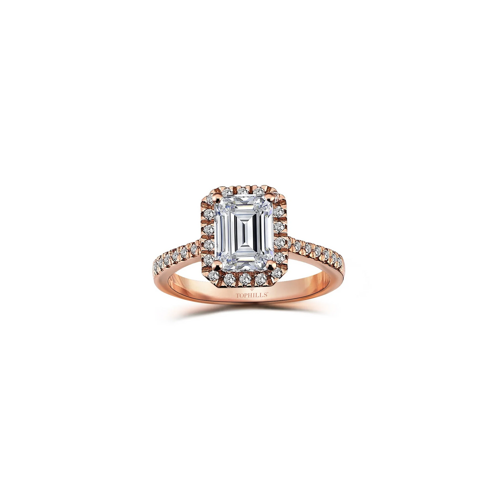 Bague solitaire en or rose et diamant taille émeraude