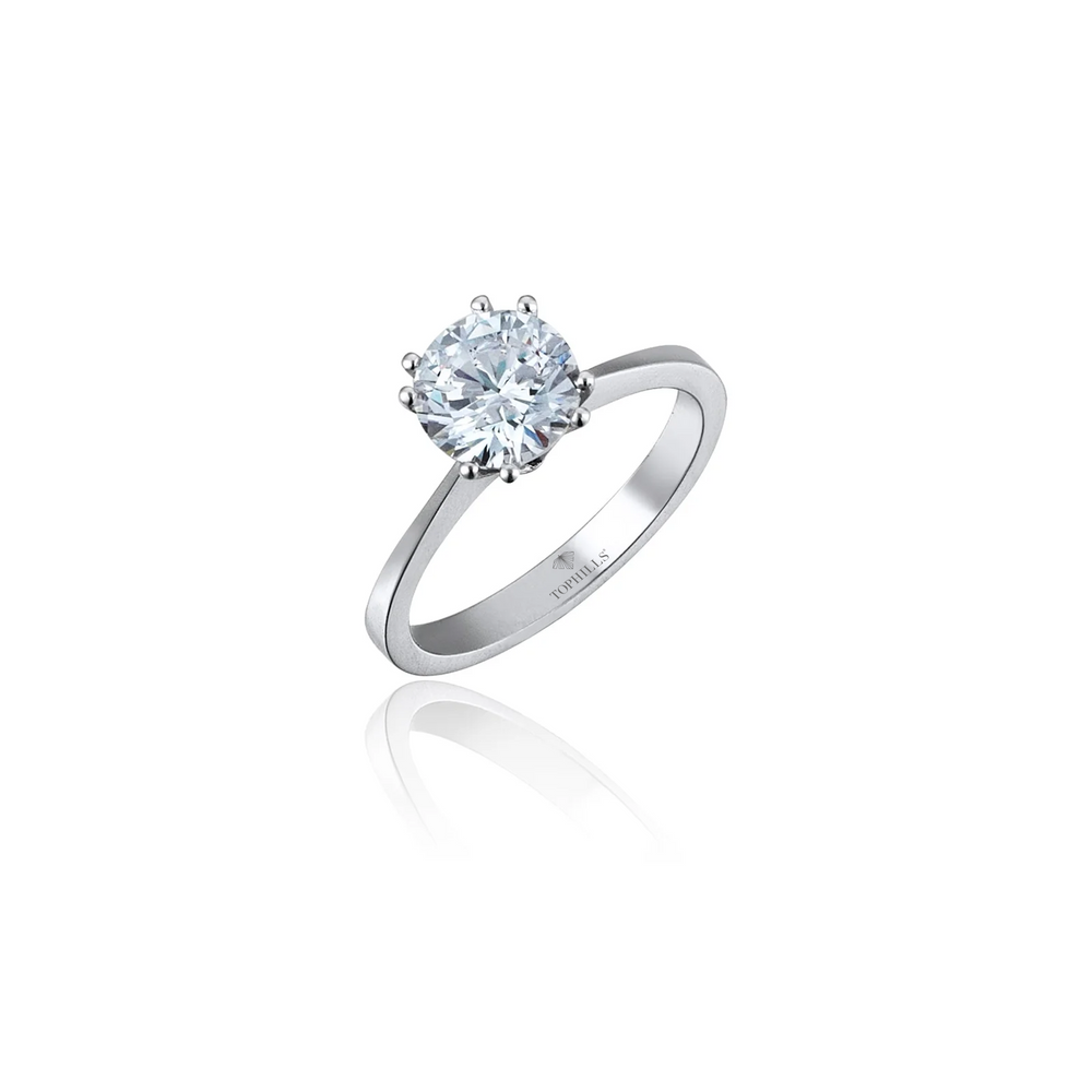 Bague solitaire diamant huit clous