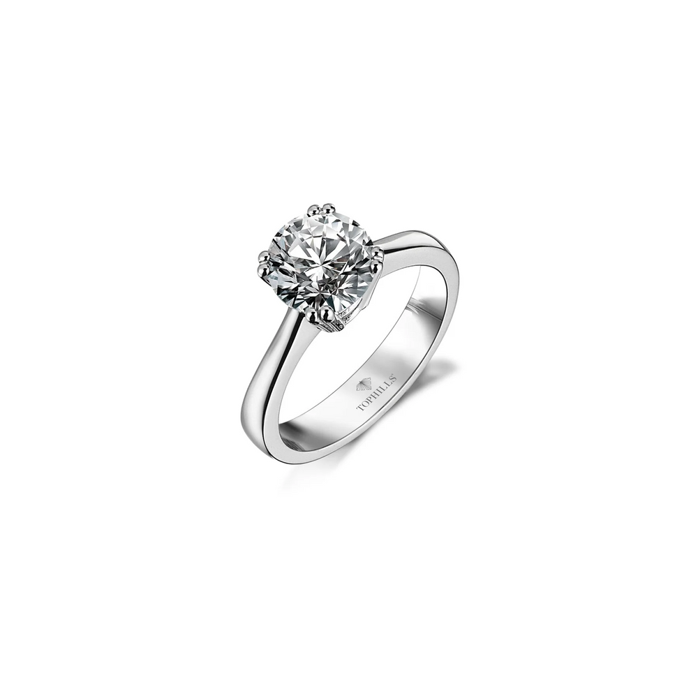 Bague solitaire diamant huit clous