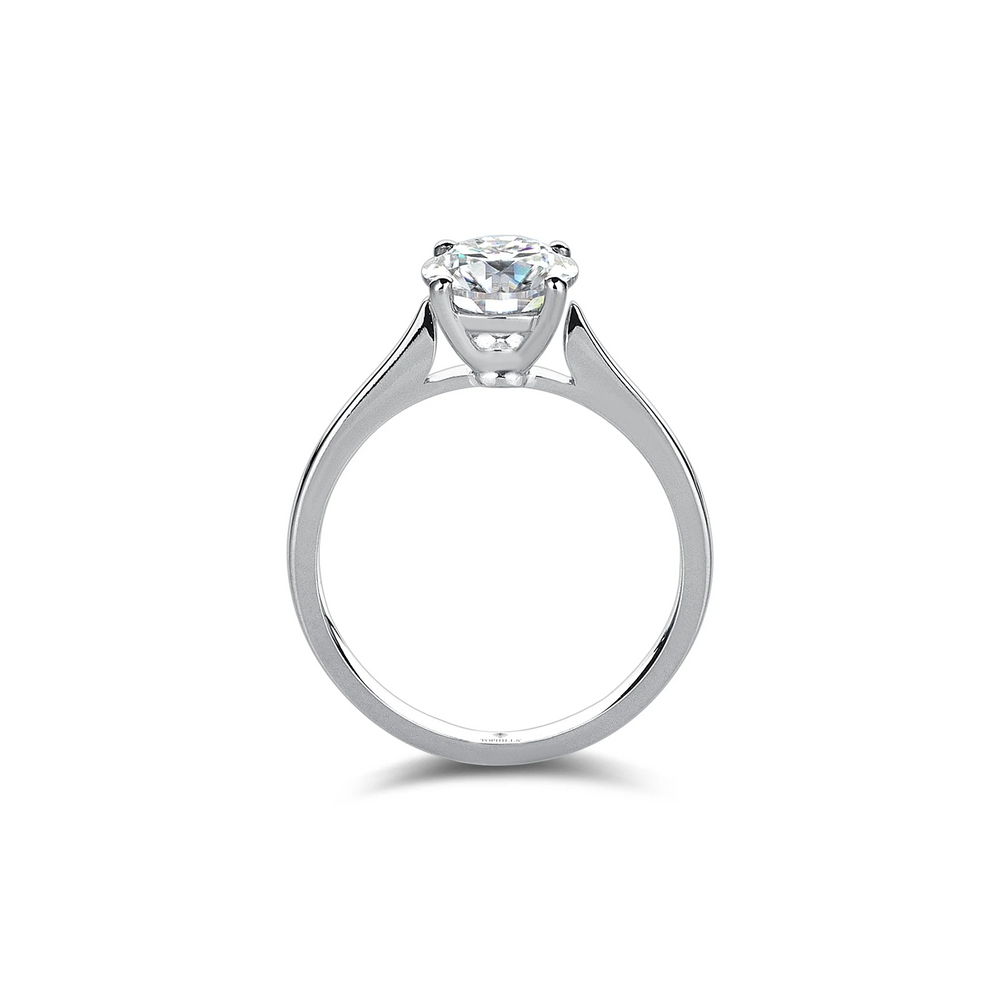 Bague solitaire en or hybride à quatre griffes et diamants